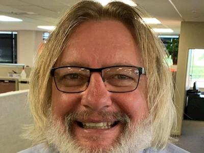 COVID hair growth prompts shave for charity challenge