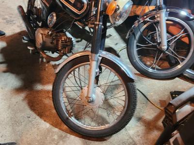 Old fellas on little bikes