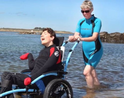 Hudson enjoying is water wheelchair